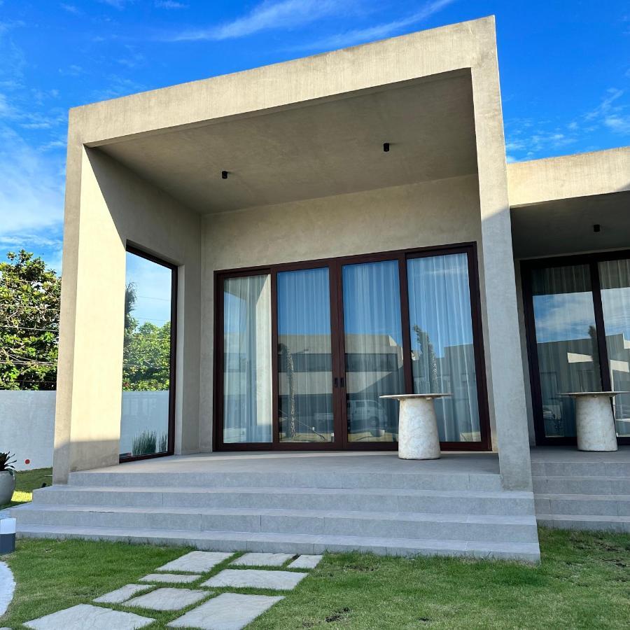 Tana Beach Villas Lian Bagian luar foto